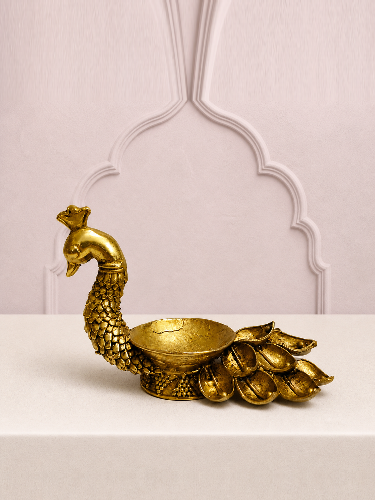 Peacock Lotus Tail Brass Diya — premium product hero