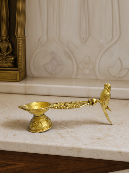 Peacock Handle Brass Diya — realistic live placement