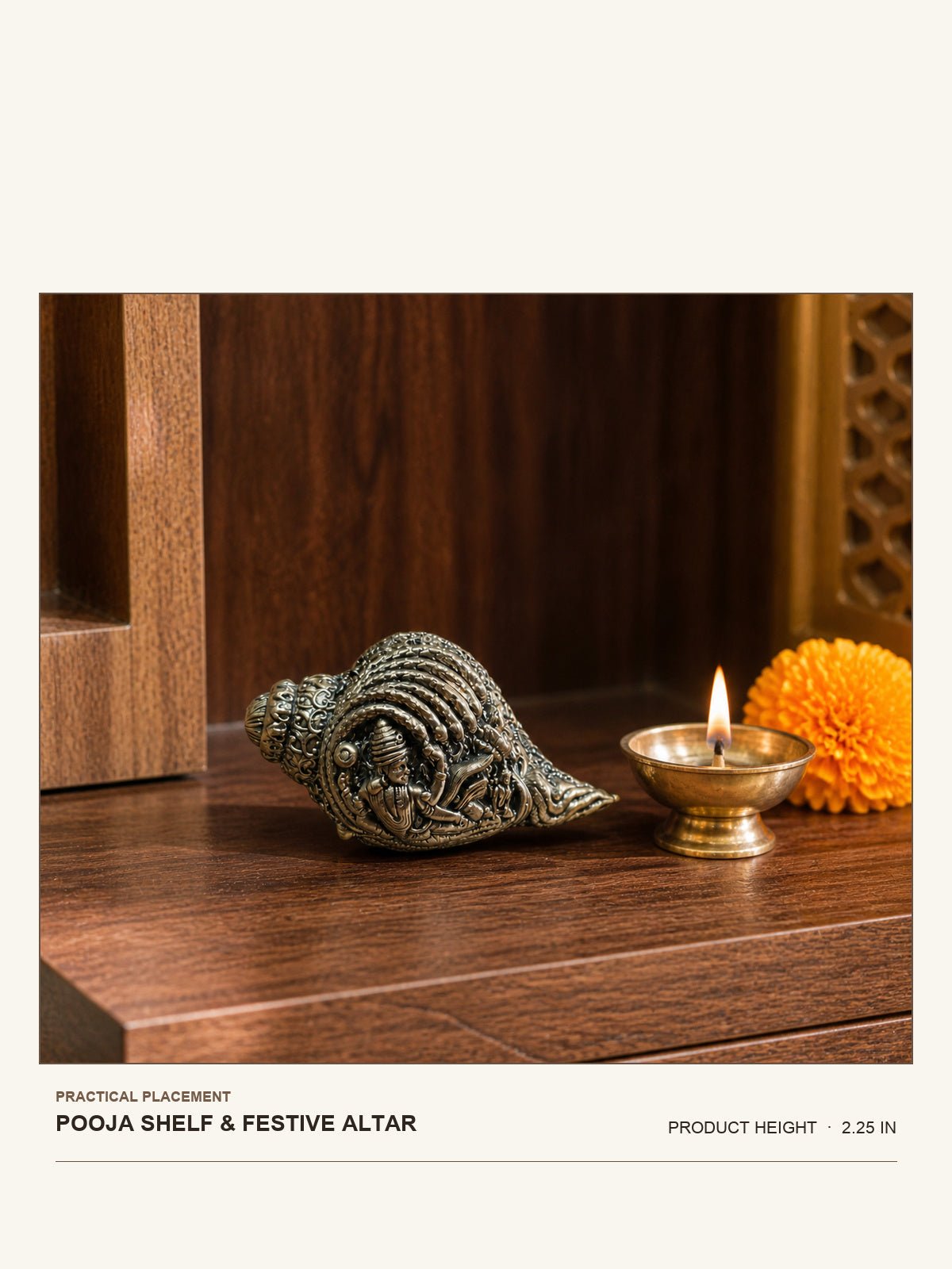 Decorative Brass Conch with Devotional Motifs shown at its 2.25-inch height on a pooja shelf or festive altar