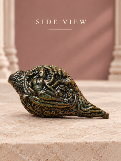Decorative Brass Conch With Devotional Motifs — Side View