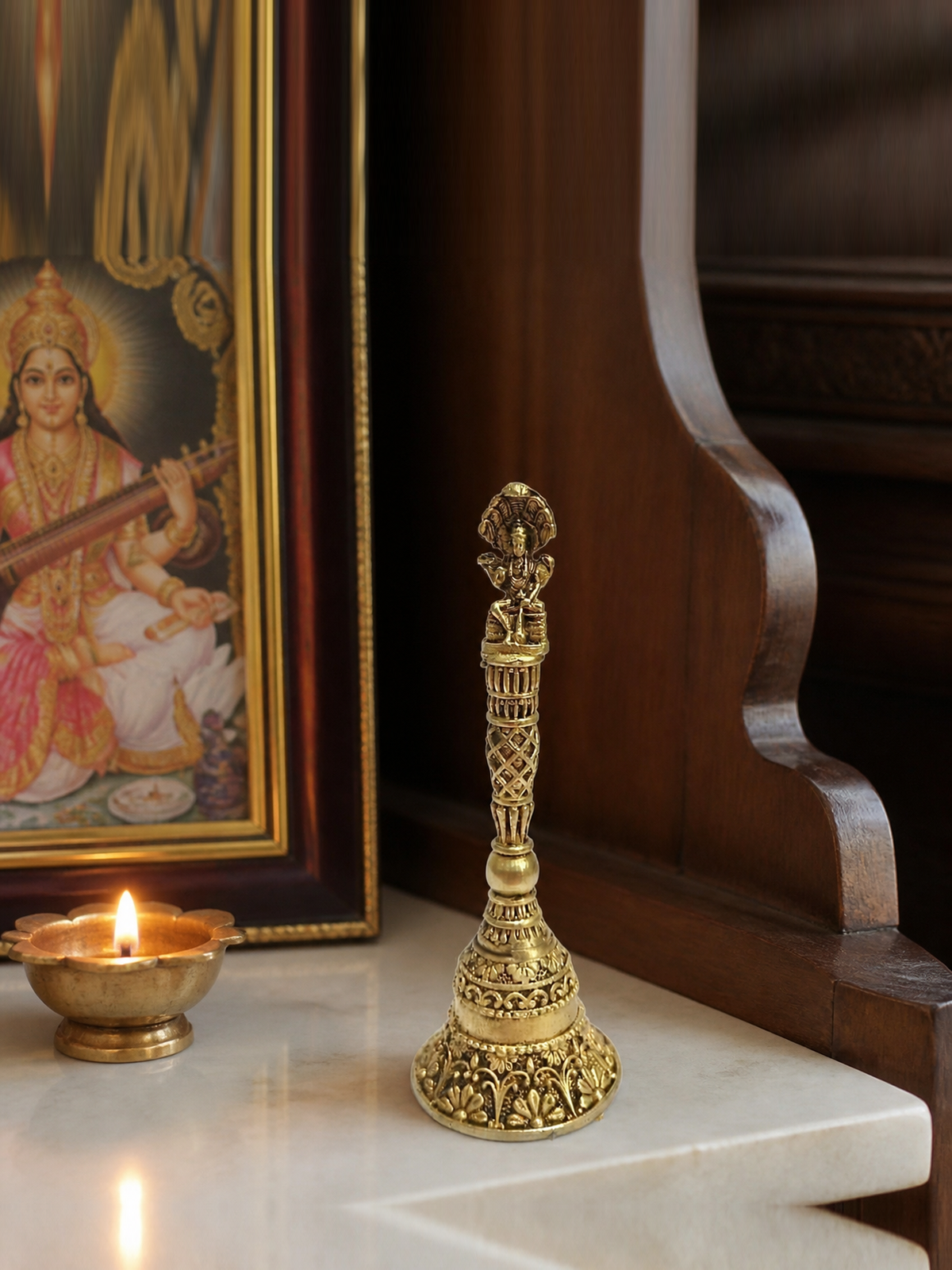 ganesha finial pooja bell realistic placement