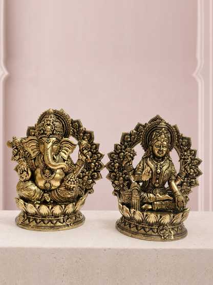 Lakshmi Ganesha Brass Idol Pair with Lotus Backplates on an ivory platform with a soft mauve heritage backdrop