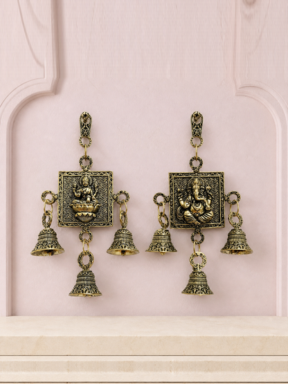 Lakshmi and Ganesha brass wall bell set displayed together on a soft mauve heritage wall