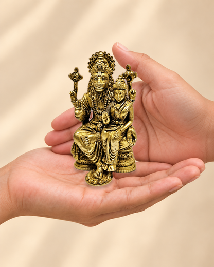 Illustrative scale view of Lakshmi Narasimha Brass Idol – 4 Inch resting on an adult open palm; listed height 4 inches.