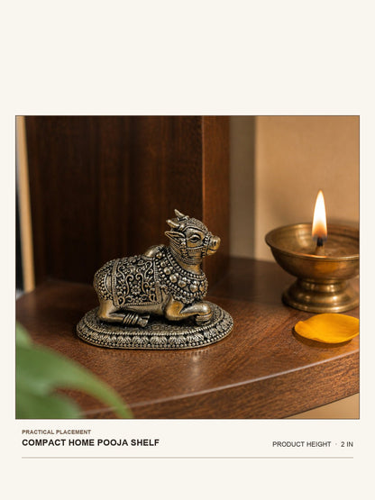 Nandi Brass Idol shown at its 2-inch height on a compact home pooja shelf