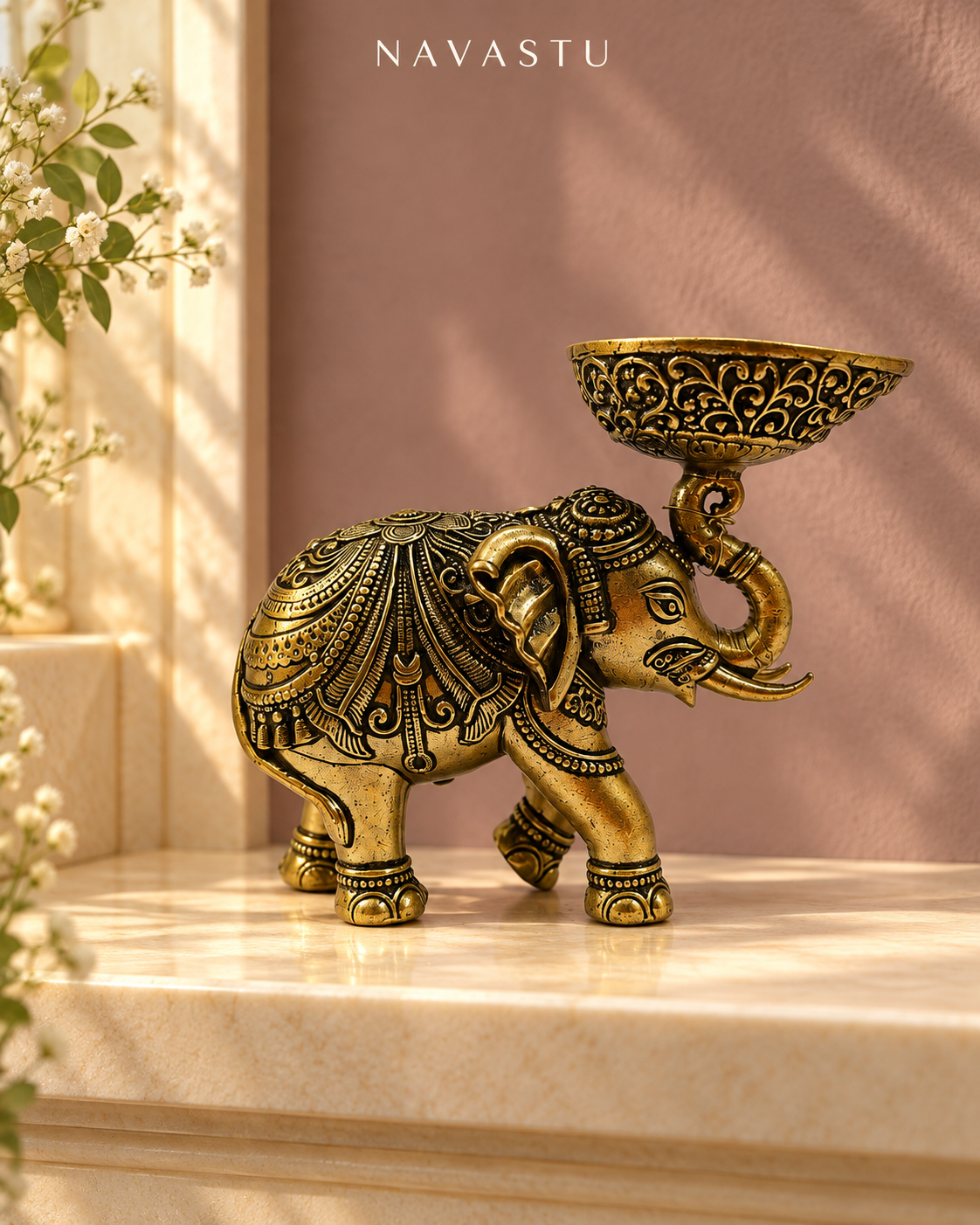 NAVASTU ChatGPT ad creative 2026-10-13 | antique-brass-elephant-diya
