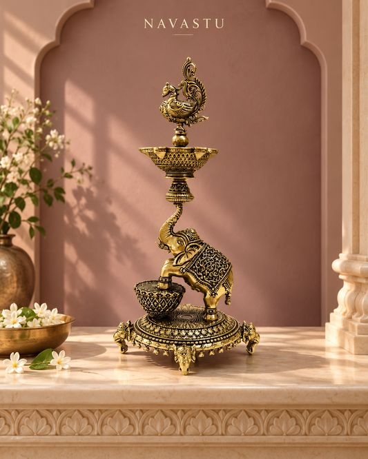 NAVASTU ChatGPT ad creative 2026-10-13 | elephant-brass-lamp-with-peacock-finial