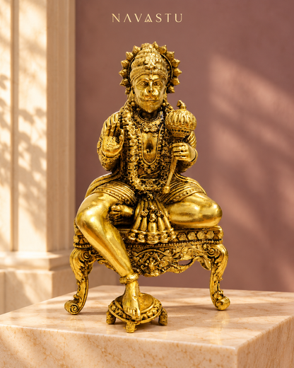 NAVASTU ChatGPT ad creative 2026-10-13 | hanuman-on-ornate-throne-brass-idol