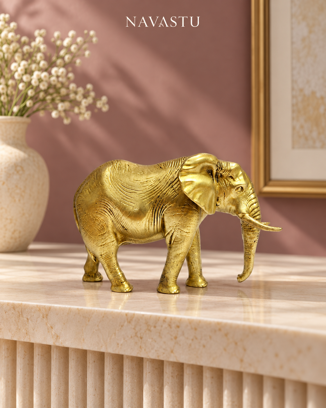 NAVASTU ChatGPT ad creative 2026-10-13 | majestic-standing-brass-elephant-decor-4-inch