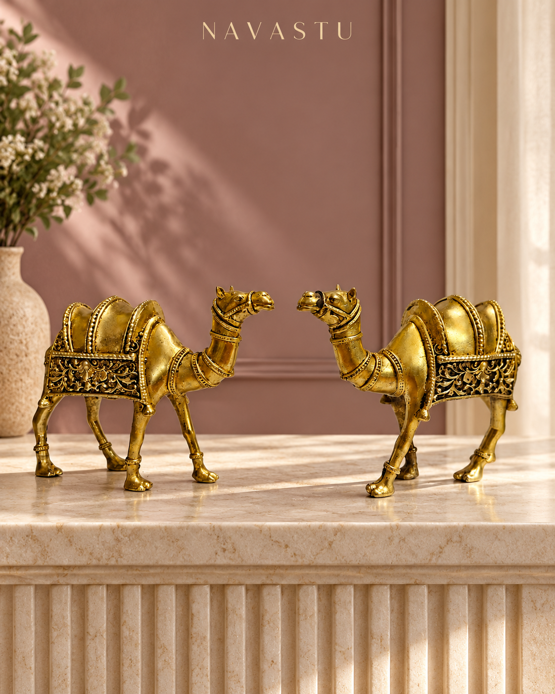 NAVASTU ChatGPT ad creative 2026-10-13 | ornate-brass-camel-pair